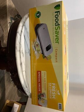 FoodSaver Compact Vacuum Sealing System in Yellow